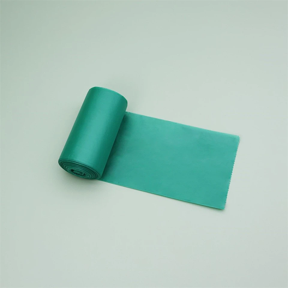 Green plastic garbage bag